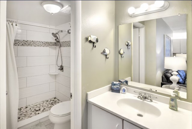 Remodeled walk-in shower Clean bright bathroom